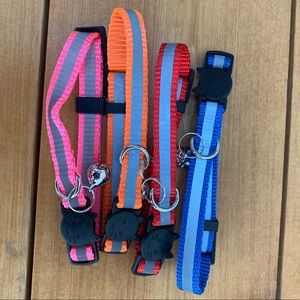 Pack of 4 breakaway reflective cat collars with snap closure and bell.